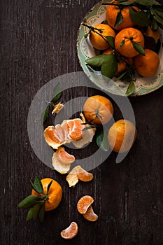 Dark moody food image of fresh ripe orange