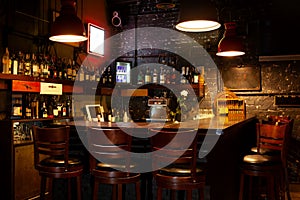 Dark moody interior of modern european pub