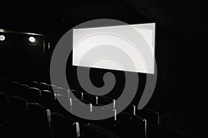 Dark movie theatre interior.