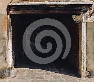 Dark and mysterious alleyway in Venice`s Jewish Ghetto.