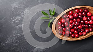 Dark And Natural: Cranberries On Wooden Dish Stock Photo