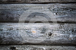 Dark old timbered wooden loghouse wall