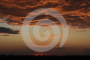 Dark orange background color - cloudy sky structure at sunset