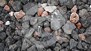 Dark porous stone gravel texture background