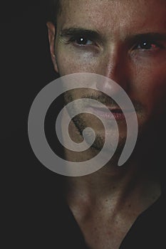 Dark portrait of an handsome man