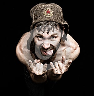 Dark portrait of scary evil sinister bearded man with smirk, makes various hand's signs and expresses different emotions