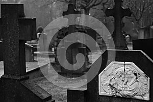 Dark portret of a historic cemetery in winter