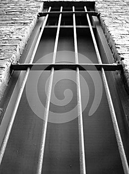 Dark prison window photo
