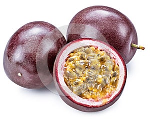 Dark purple passion fruits and half of fruit on white background