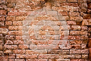 Dark red old bricks wall.