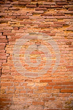 Dark red old bricks wall.