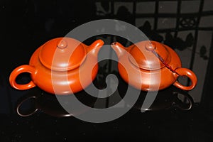 Dark red enameled pottery