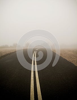 Dark Road in Fog