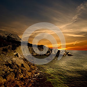 Dark rock and sea coast