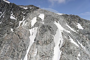 Dark rocky cliffs of the Abbess peak at Liebig range,  New Zealand