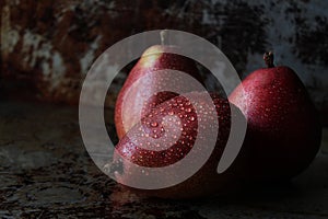 Dark and moody anjou pears photo