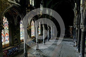 Dark Sanctuary with Stunning Stained Glass Windows and Wood Floor - Abandoned Church