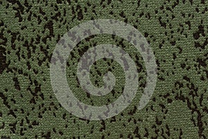 Dark saturated green textile background.