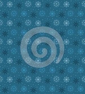 Dark seamless pattern of many light snowflakes on blue background. Soft Christmas winter theme for gift wrapping. New Year