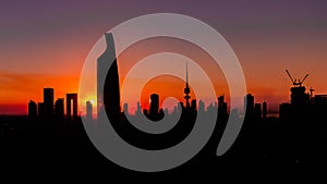 Dark Silhouettes of skyscrapers and buildings - Sunset in Kuwait City - Magenta