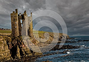 Dark Skies over the ruins o Keiss Castle, Caithness Scotland, UK, photo