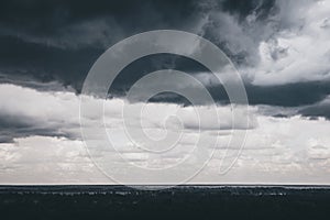 Dark sky and black clouds before rainy, Dramatic black cloud thunderstorm