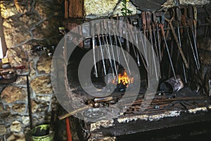 Dark smithy with blacksmith tools