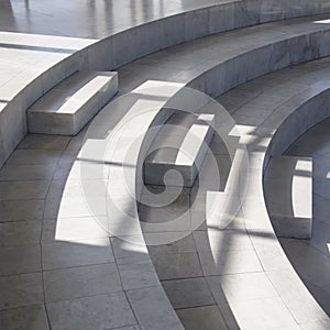 Dark smooth lines of shadows in a light marble interior