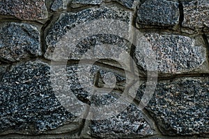 Dark stone wall texture. Stone wall background. Dark rock pattern texture. Granite pattern of natural background.