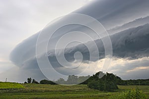 Dark storm cloud moves round the front