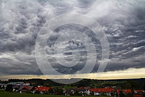 Dark storm clouds over a city
