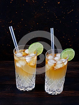 Dark and stormy cocktail with ginger ale and rum