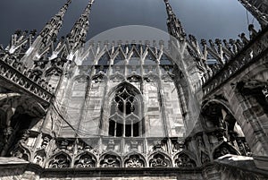 Dark stormy macabre HDR photo of Duomo, Milan