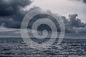 Dark stormy sea and dramatic clouds, gloomy nature