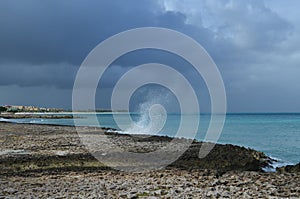 Dark Stormy Skies Over Lava Rock Coast in Aruba