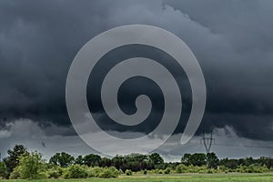 Dark, swirling, threatening clouds in the sky.