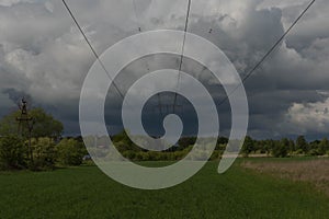 Dark, swirling, threatening clouds in the sky.