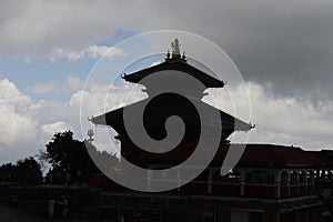 Dark temple silhouette formed in the sky in Nepal. Japanese pagoda temple architecture.