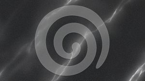 Abstract dark textured background with flowing waves and subtle light reflections, creating a sense of depth and photo