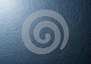 Dark textured background featuring a smooth gradient from light to