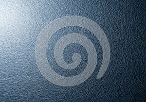 Dark textured surface with a subtle gradient, transitioning from a