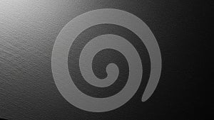 Dark Textured Surface with Subtle Light Gradient background