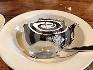 Dark thick chocolate vanilla wiped cream photo