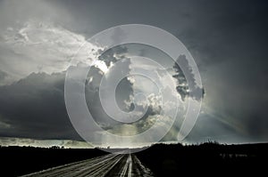 Dark thunder clouds and dramatic storms fill the sky over the sw