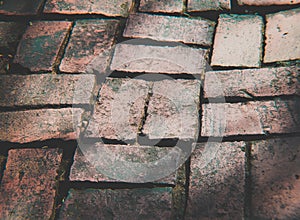 Dark tile floor or brick wall background