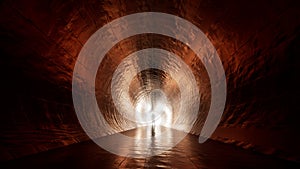 Dark tunnel with a bright light at the end or exit as metaphor to success, faith, future or hope