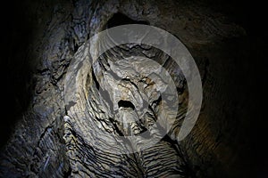 Dark tunnel in Ruakuri Cave, Waitomo, NZ