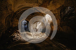 Dark underground cellar under old castle
