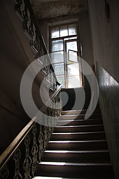 Dark vintage staircase interior in old building