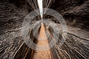 Dark Walls Run Parallel Along Narrow Slot Canyon